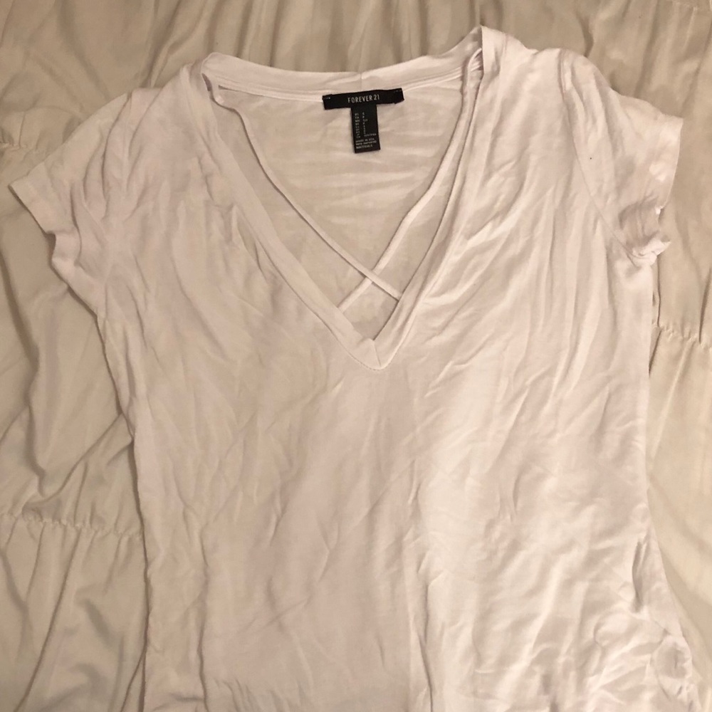 Simple white v neck with cross design